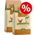Two 10 kg bags labelled 'Chicken with trout', 'Adult', cold-pressed, visible chicken and fish images, red percentage discount symbol top right. Some text in English, German, French. Two 10 kg bags labelled 'Chicken with trout', 'Adult', cold-pressed, visible chicken and fish images, red percentage discount symbol top right. Some text in English, German, French.