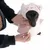 Dog wearing pink hooded coat with sheep motif, hands fastening the coat's buttons.