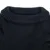 Pull en maille noire pour animal, col rond côtelé, matière tricotée visible. Aucun logo ni texte apparent.