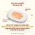 Salmon and chicken cat food with rice and vegetable jelly on a plate. Text: 100% human-grade meat and/or fish, originally fit for human consumption, now food for your cat.