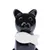 Figurine en céramique noire représentant un chat tenant un poisson blanc dans sa bouche.
