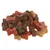 Mélange de friandises pour chien en forme d’os, couleurs marron, rouge, beige et noir, sans emballage visible.