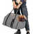 Grey carrier bag with black handles and a dog looking out of the bag. Suitable for transporting pets.