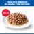 Trocitos Premium en salsa con carne de res, servidos en un plato blanco. Texto: Trocitos en salsa.
