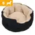 Okrągłe legowisko z beżowym wnętrzem i czarnymi bokami, rozmiar S oznaczony ikoną psa w lewym górnym rogu. Okrągłe legowisko z beżowym wnętrzem i czarnymi bokami, rozmiar S oznaczony ikoną psa w lewym górnym rogu.