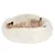 Animal lying comfortably on a large, round, fluffy white bed, demonstrating use of the product for relaxation or rest.
