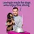 Text reads: Lovingly made for dogs who enjoy fine dining. Image shows a person holding a dog next to a table with a covered dish and a lit candle.