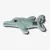 Soft plush toy shaped like a crocodile with stitched details and a visible brand label on its side.