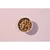 Bowl filled with small, cubed pieces of brown pet food or treats, shown from above on a plain background.