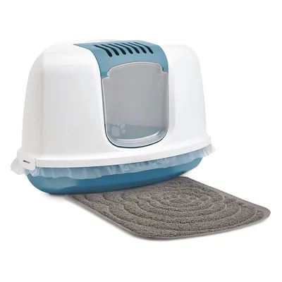 Zatvoreni plastični WC za mačke s prozirnim vratima, plavim poklopcem s ventilacijskim otvorima i sivom prostirkom ispred ulaza.