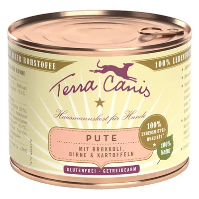 Boîte Terra Canis pour chiens, dinde avec brocoli, poire et pommes de terre, sans gluten, 100 % qualité alimentaire, 100 % naturel. Texte en allemand sur l’étiquette.