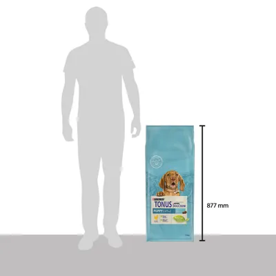 Confronto dimensioni: sacco Purina Tonus Dog Chow Puppy con cane in etichetta, altezza 877 mm accanto a sagoma umana. Peso visibile: 14 kg.