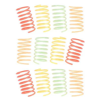 Set aus bunten Kunststoffspiralen in Rot, Gelb, Grün und Orange. Ideal als Spielzeug oder Zubehör.