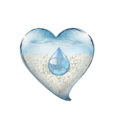 Heart symbol with water and white pebbles, representing freshness or moisture retention.