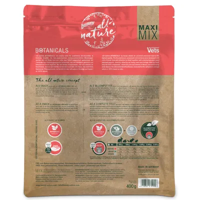 Опаковка Bunny all nature Botanicals Maxi Mix 400 г. Видими са таблица за хранене според теглото, икони за съставки и текст на немски и английски за употреба като снакс или пълноценна храна. Опаковка Bunny all nature Botanicals Maxi Mix 400 г. Видими са таблица за хранене според теглото, икони за съставки и текст на немски и английски за употреба като снакс или пълноценна храна.