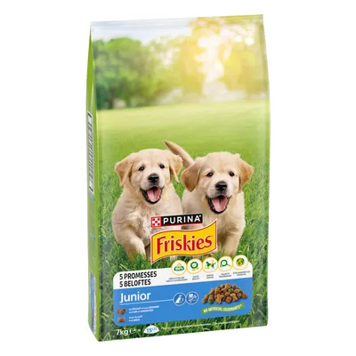 Confezione di crocchette Purina Friskies Junior, 7 kg, con immagine di due cuccioli, testo visibile: 5 promesse, no artificial colourants, pollo e verdure, latte, cereali.