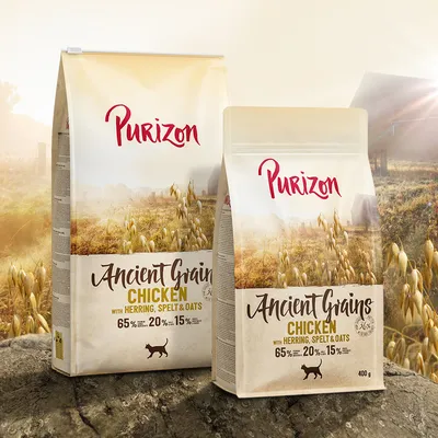 Purizon Ancient Grains Chicken mit Hering, Dinkel & Hafer. 65% Fleisch, 20% Gemüse, 15% Getreide. Verpackung in zwei Grössen: 400g und grössere Packung sichtbar.
