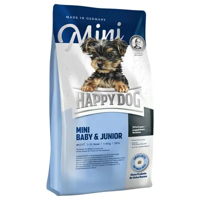 Sac Happy Dog Mini Baby & Junior, 1–12 mois, 1–10 kg, 26 % protéines, croquettes petites races, texte en anglais et allemand visible sur l'emballage.