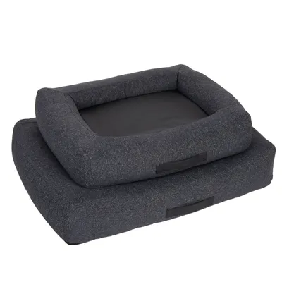 Two dark grey pet beds with raised edge and black lying surface, shown stackable.