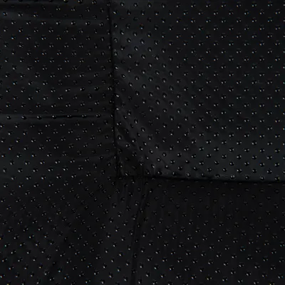 Black fabric with non-slip surface and dotted pattern, suitable for pet accessories or upholstery.