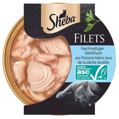 Sheba Filets, duurzame witvis. ASC-gecertificeerd. Verpakking toont visfilets in saus en tekst in Duits en Frans over duurzame visserij.