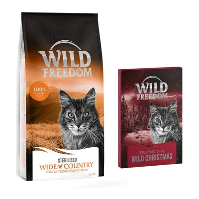 Balení Wild Freedom Sterilised Wide Country 6,5 kg s textem 100% grain-free recipe a krabička Wild Freedom Dreamin' of a Wild Christmas 18 g. Obě s obrázkem kočky.