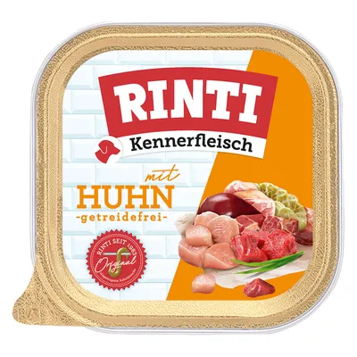Rinti Kennerfleisch mit Huhn, getreidefrei. Original seit 1983. Abgebildet: Fleischstücke und Zutaten.
