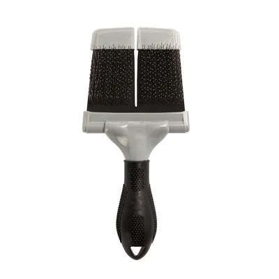 Silver and black grooming brush with ergonomic handle and flexible bristles for pet care.