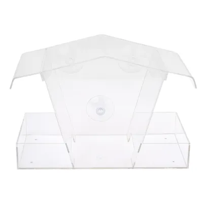 Transparent birdhouse made of plastic with suction cups for attaching to windows.