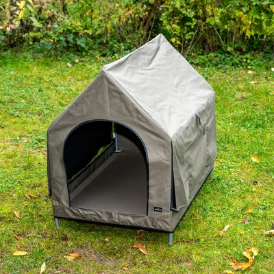 Outdoor-huisdierentent in beige met stevig metalen frame, rechthoekige ingang en waterafstotende stof. Geschikt voor tuin of buitenruimte.