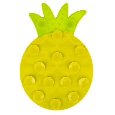 Gul silikonmatta i form av en ananas med sugproppar, lämplig för olika användningsområden.