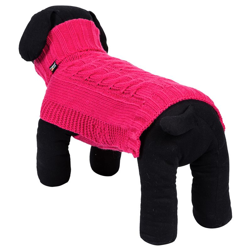 Modelo de perro con jersey de punto rosa, diseño de trenzas y cuello alto. Etiqueta visible con la marca Trixie.