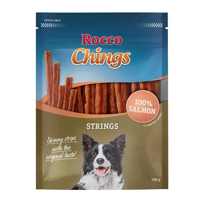Rocco Chings Strings, 100% losos, tanke trakice s originalnim okusom, 150 g. Pakiranje prikazuje psa i sliku proizvoda.