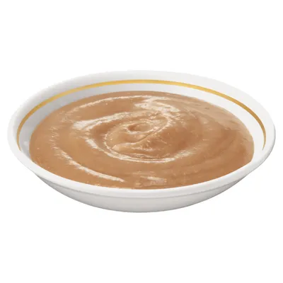 Bowl of smooth brown pet food puree in a white dish with a gold stripe around the rim, shown on a plain background.