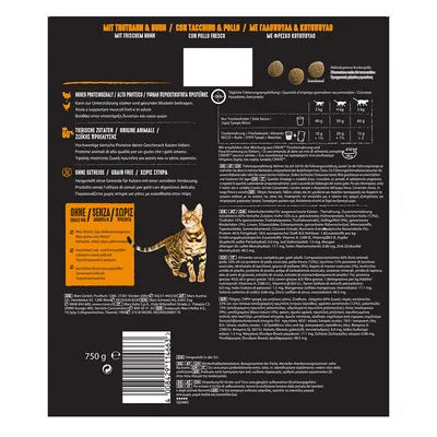 Задняя сторона упаковки корма для кошек с индейкой и курицей, рекомендации по кормлению, состав, таблица дозировки, вес 750 г, изображение кошки, маркировка без зерна.