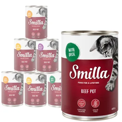 Selection of Smilla Beef Pot tins with visible labels showing flavours including duck, chicken, turkey and chicken liver. Icons indicate contains taurine and grain-free.
