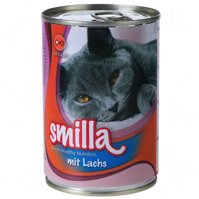 Lata de comida para gatos Smilla, texto visible: 'Finest Healthy Nutrition', 'mit Lachs', 'mit Taurin', imagen de un gato gris en la etiqueta.