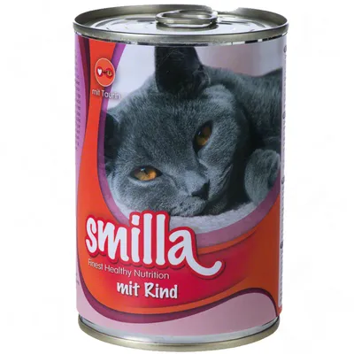 Lata de comida para gatos Smilla mit Rind, con imagen de un gato gris en la etiqueta. Texto visible: 'Finest Healthy Nutrition', 'mit Taurin'.
