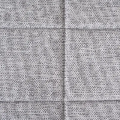 Close-up of grey fabric with fine weave structure, suitable for upholstery or home textiles.