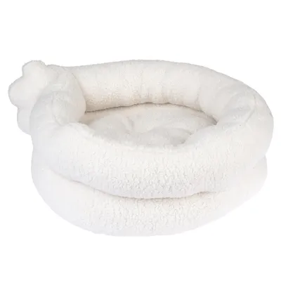 White, round pet bed made of soft plush material with raised edge for extra comfort.