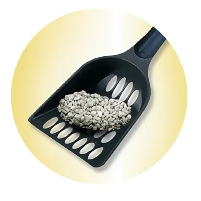 Black litter scoop with holes, collects clumps of cat litter.