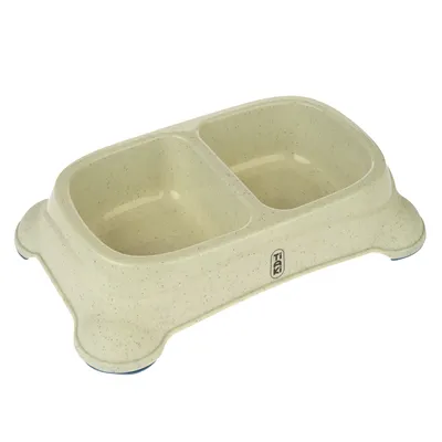 Dublu bol din plastic bej cu două compartimente și logo Trixie, potrivit pentru apă și hrană.