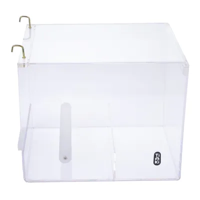 Transparent acrylic box with two gold-coloured hooks and a white rod. Tiaki logo visible at bottom right.