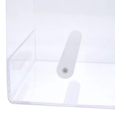 Transparent plastic box with a white cylindrical rod and screw visible inside.