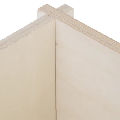 Close-up view of two connected panels made of light plywood.