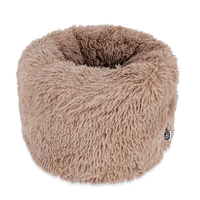 Rundes, flauschiges Tierbett in beige mit weichem Plüschmaterial und sichtbarem Markenetikett 'Trixie'.