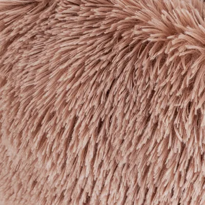Nahaufnahme von weichem, flauschigem Material in rosa Farbe. Geeignet für die Beschreibung der Textur eines Produkts.