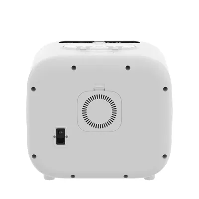 Rear view of a white device with ventilation grille and power switch. Visible screws for mounting.