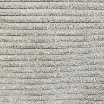 Close-up of grey, ribbed fabric material with soft texture.