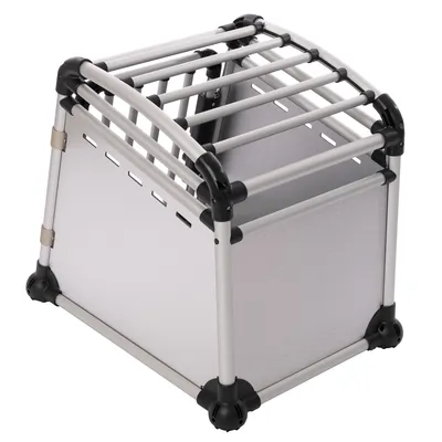 Transportbox aus Metall und Kunststoff mit Gitterstäben und geschlossenen Seitenwänden, geeignet für sicheren Transport von Haustieren.